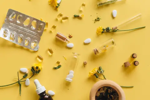 an image of vitamin supplements with yellow background