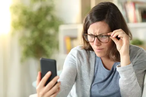 an image of a female with farsightedness