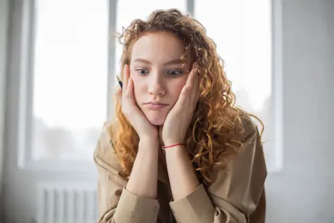 an image of frustrated female