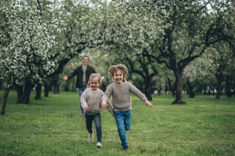 two boys running 