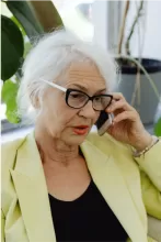 An image of an older adult talking on the phone image courtsey of karolina grabowska