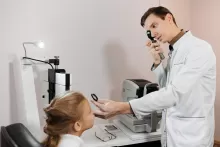 a girl having an eye exam